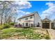 Home exterior featuring a wood deck, storage shed, and well-maintained lawn at 17420 Dalton Ct, Noblesville, IN 46062