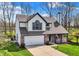 Charming two-story home with a well-maintained lawn, attached garage, and welcoming front porch at 17420 Dalton Ct, Noblesville, IN 46062