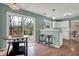 Eat-in kitchen area with a view to the deck through sliding glass doors at 17420 Dalton Ct, Noblesville, IN 46062