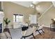 Bright living room with fireplace, hardwood floors, and comfortable seating at 17420 Dalton Ct, Noblesville, IN 46062