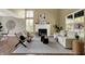 Bright living room with fireplace, hardwood floors, and comfortable seating at 17420 Dalton Ct, Noblesville, IN 46062