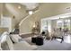 Open-concept living room with neutral tones, hardwood floors, and ample natural light at 17420 Dalton Ct, Noblesville, IN 46062