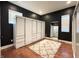 Spacious bedroom features hardwood floors, wardrobe closet, and ample natural light at 1818 N Cornell Ave, Indianapolis, IN 46202