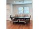 Modern dining area with wood floors and pendant lighting at 1818 N Cornell Ave, Indianapolis, IN 46202