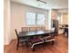 Dining area with modern pendant lighting adjacent to the kitchen at 1818 N Cornell Ave, Indianapolis, IN 46202