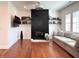 Comfortable living room features a fireplace, modern decor, and natural light at 1818 N Cornell Ave, Indianapolis, IN 46202