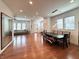 Expansive living room with hardwood floors, dining area, and abundant natural light at 1818 N Cornell Ave, Indianapolis, IN 46202
