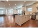 Open floor plan features a spacious living area, dining area, and kitchen with a large center island at 1818 N Cornell Ave, Indianapolis, IN 46202
