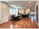 Open-concept living space featuring hardwood floors, kitchen, and dining area at 1818 N Cornell Ave, Indianapolis, IN 46202