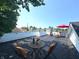 Inviting rooftop deck features lounge seating and city views, perfect for relaxing and entertaining at 1818 N Cornell Ave, Indianapolis, IN 46202