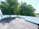 Spacious roof deck with beautiful greenery views, ideal for relaxation and outdoor enjoyment at 1818 N Cornell Ave, Indianapolis, IN 46202
