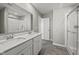 Modern bathroom with quartz counters, tile flooring, and standing shower at 2061 W 171St St, Westfield, IN 46074