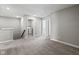 Carpeted bonus room with laundry room access and stairway at 2061 W 171St St, Westfield, IN 46074