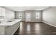 Bright living room featuring hardwood floors, a modern color scheme and natural light from the backyard at 2061 W 171St St, Westfield, IN 46074