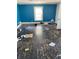 Bedroom with hardwood floors and blue painted walls at 207 E Broadway St, Alexandria, IN 46001