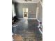 View of a living room with hardwood floors with stairs at 207 E Broadway St, Alexandria, IN 46001