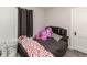Cozy bedroom with a decorated bed at 211 Jones St, Columbus, IN 47201
