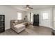 Bright living room featuring hardwood floors, a ceiling fan, and fresh paint, creating a relaxing and stylish atmosphere at 211 Jones St, Columbus, IN 47201