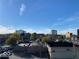 Expansive city view showcasing the skyline and surrounding architecture under a beautiful blue sky at 230 E 9Th St # 506, Indianapolis, IN 46204