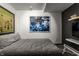 Serene bedroom features unique artwork, contemporary accents, and an abundance of natural light at 2417 E 80Th E St, Indianapolis, IN 46240