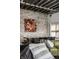 Dining room with a chandelier, exposed brick wall, and large wooden table at 2417 E 80Th E St, Indianapolis, IN 46240