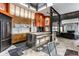 This kitchen features a large island with barstool seating and is open to the living room at 2417 E 80Th E St, Indianapolis, IN 46240