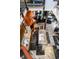 Unique overhead shot of a modern kitchen showcasing an island, stone floors, and contemporary furnishings in an open layout at 2417 E 80Th E St, Indianapolis, IN 46240