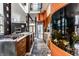 Modern kitchen featuring a large island, stainless steel appliances, and unique architectural elements at 2417 E 80Th E St, Indianapolis, IN 46240
