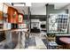 Living room area with open kitchen, architectural features and ample natural light at 2417 E 80Th E St, Indianapolis, IN 46240