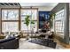 Office space featuring large windows, modern desk, chair and décor at 2417 E 80Th E St, Indianapolis, IN 46240