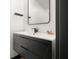 Modern bathroom vanity featuring a geometric design and matte black finishes at 2625 15Th St, Columbus, IN 47201