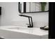 Modern sink and vanity in updated bathroom, new mirror, and light fixtures at 2625 15Th St, Columbus, IN 47201