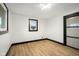 Well-lit bedroom boasts new floors, paint, and modern trim at 2625 15Th St, Columbus, IN 47201