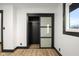 Spacious closet with a glass sliding door and wire shelf for organized storage at 2625 15Th St, Columbus, IN 47201