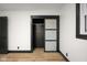 Spacious closet with a glass sliding door and wire shelf for organized storage at 2625 15Th St, Columbus, IN 47201