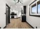 Open floor plan shows kitchen with stainless steel appliances and modern finishes at 2625 15Th St, Columbus, IN 47201
