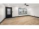 Bright living room with new floors, baseboards, windows and paint throughout at 2625 15Th St, Columbus, IN 47201
