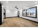 Open concept living room with new windows, floors and black trim throughout at 2625 15Th St, Columbus, IN 47201