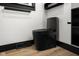 Modern toilet with updated plumbing and design in a newly renovated bathroom at 2625 15Th St, Columbus, IN 47201