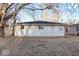 A backyard with a white sided home at 3130 Elizabeth St, Indianapolis, IN 46234