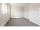 Bedroom featuring carpet, a window, and neutral wall color at 3130 Elizabeth St, Indianapolis, IN 46234
