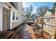 Relaxing backyard featuring a wooden deck with a hot tub and outdoor furniture, great for leisure at 320 15Th St, Columbus, IN 47201