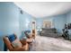Bright living room featuring hardwood floors, stylish furniture, and plenty of natural light at 320 15Th St, Columbus, IN 47201
