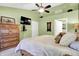 Bright main bedroom features carpet, large window, walk in closet and an attached bathroom at 4139 Bella Ct, Indianapolis, IN 46237