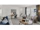 Open living area with comfortable seating, a workspace, and plenty of natural light at 4435 Laughter Ln, Indianapolis, IN 46235
