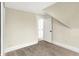 Bedroom with neutral walls and carpet, featuring a doorway and bright interior at 462 W Broadway St, Greenwood, IN 46142