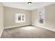 Neutral bedroom featuring a bay window and neutral carpet at 462 W Broadway St, Greenwood, IN 46142