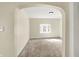 Neutral bedroom featuring a large window and neutral carpet at 462 W Broadway St, Greenwood, IN 46142