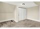 Bright bedroom boasts a double-door closet, offering ample storage and a cozy carpeted floor at 462 W Broadway St, Greenwood, IN 46142