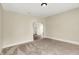 Neutral bedroom featuring a large window and neutral carpet at 462 W Broadway St, Greenwood, IN 46142